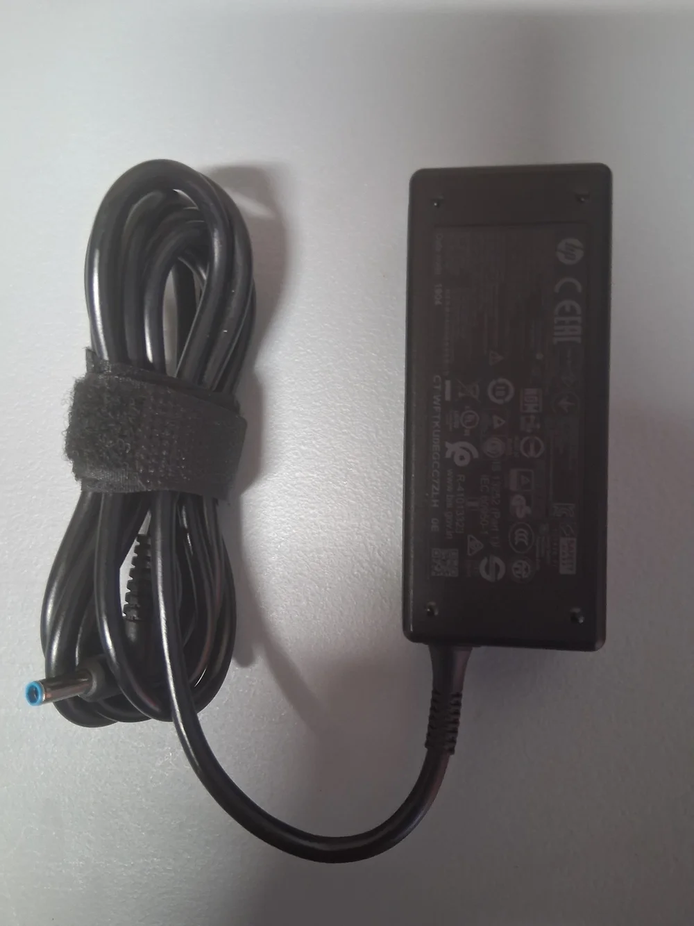 HP 45W 19.5V AC Power Adapter with Blue-Tip Connector, Model No. R-41013323.